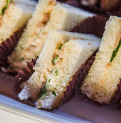 dark bread sandwiches with cream cheese and ham