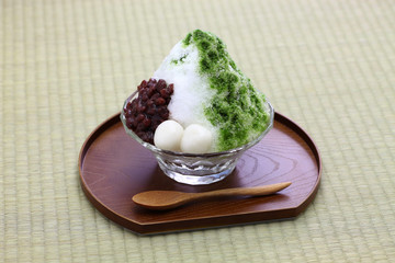 ujikintoki kakigori, japanese shaved ice with matcha green tea syrup and azuki red beans jam...