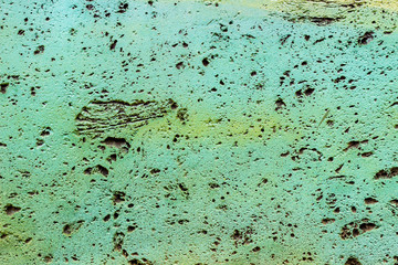 Bright colorful background. Painted concrete in different pastel colors. Bright and fresh palette of halftones.