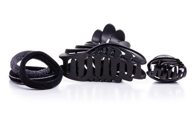 Obraz premium Black barrette and scrunchy on white background isolation