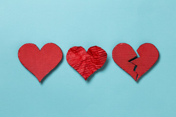 Valentine's Day. Three hearts on cyan background