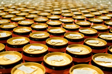 Golden metal beer cans background