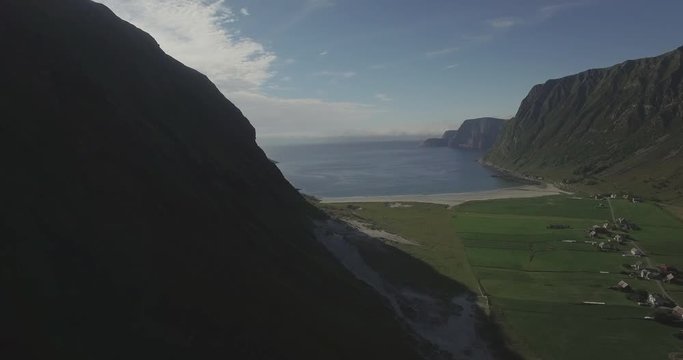 Drone shot from Hoddevika between hight mountains. Surf location in Norway.