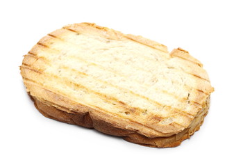 Fried whole wheat toast bread slices isolated on white background