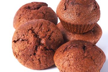 A few dark chocolate dough muffin on isolated on white background.