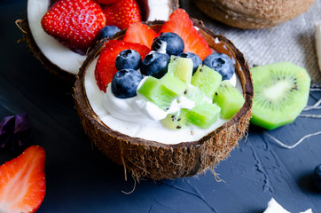 delicate dessert with cream, powdered sugar and berries