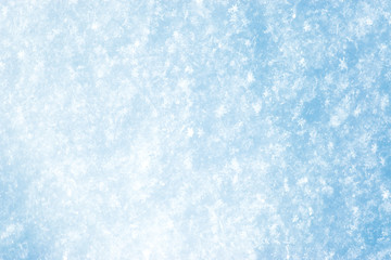 Background of the light blue bright snow close up