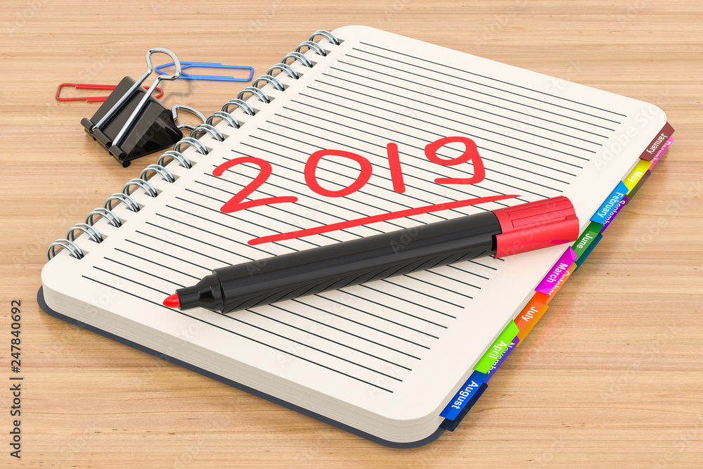 Poster text 2019 on notebook with marker pen on the wooden desk. 3d rendering