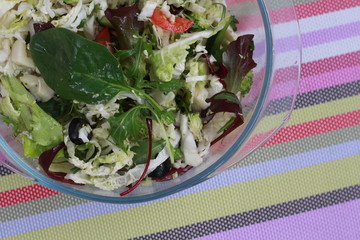 salad of ñabbage  broccoli and spinach in the glass bowl