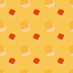 Seamless background pattern with various colored spots.