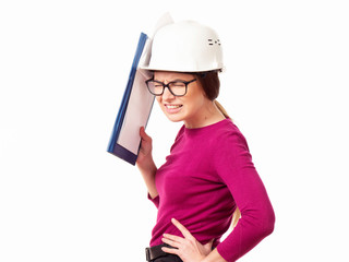 Emotional girl brigadier in a white helmet with glasses and a folder in his hands on a white background