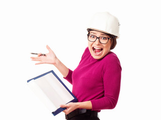 Emotional girl brigadier in a white helmet with glasses and a folder in his hands on a white background