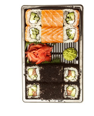 Sushi Rolls Set, maki, california rolls, on black plate and on white background.
