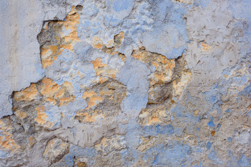 The texture of the stone-concrete wall. Damaged surface. Chipped and cracked. Old gray stone wall. Black Sea. Massandra beach. Yalta. Rest in Crimea. Walk along the beach.