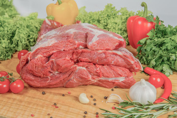 Juicy raw meat, beef entrecote on black background, top view