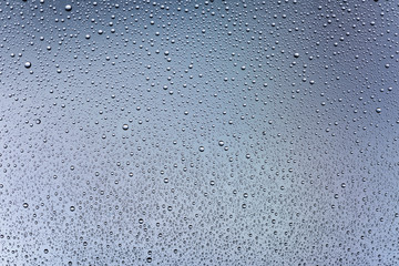 Drops of water on the glass.