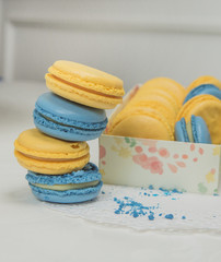 sweet french macaroon on white isolated white background. fly falling sweet macaroni