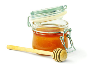 Fragrant and healthy natural honey in a glass jar. Diet. Healthy lifestyle. Cookery / Baking Ingredients.