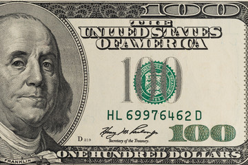 Closeup photo of a 100 dollar bill