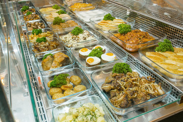 Top view of freshly prepared delicious Mediterranean dishes assorted in the restaurant, buffet
