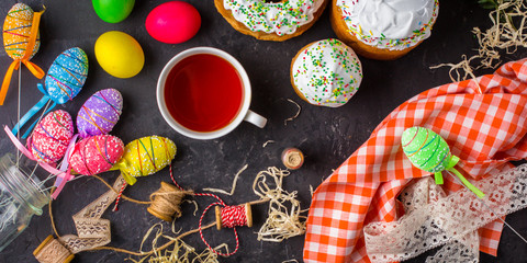 Easter cake and Easter eggs, traditional holiday attributes (Happy Easter!). food background. top view