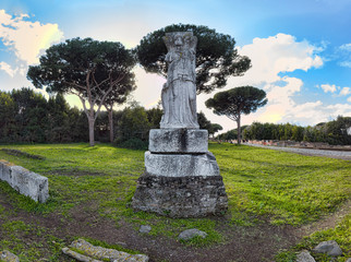 Fototapeta premium Roman statue Minerva - Vittoria Alata - located in archaeological site at Ostia Antica - Rome - Italy