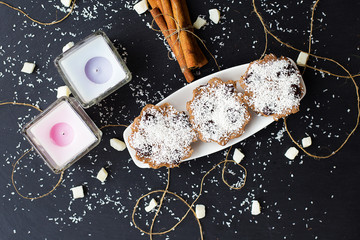 coconut muffins on a black background