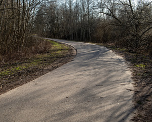 empty asphalt road outside city