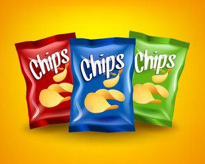 Set of red, blue and green chips packages with yellow crispy snacks, advertising concept