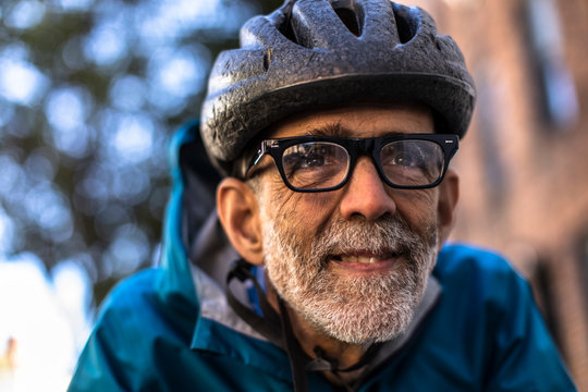 portrait of senior man biking