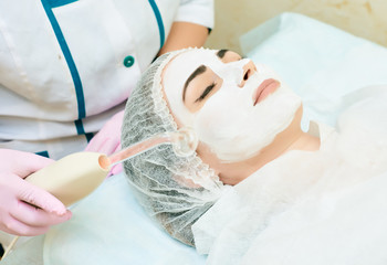 cosmetology room, treatment and skin cleansing with hardware, acne treatment, elimination of the causes of problem skin