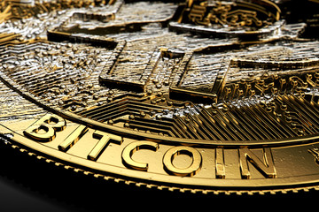Close-up shot on damaged Bitcoin laying on dark background. Bitcoin crash concept. 3D rendering
