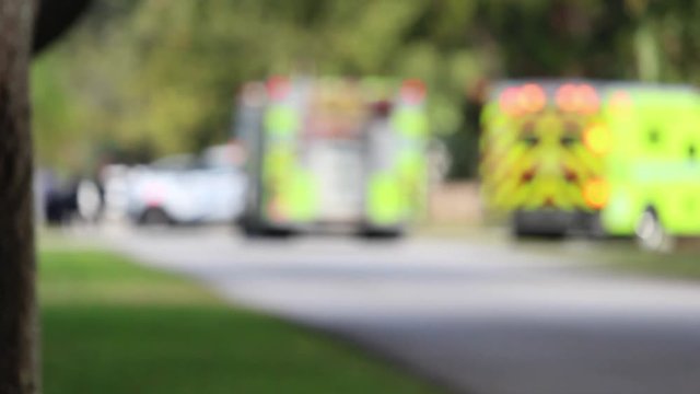 Lights on Emergency Vehicles, blurred image of First responders at accident scene