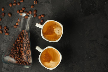 coffee freshly brewed in a white cup serving of beverage (coffee grain). food. top.copy save