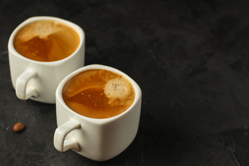 coffee freshly brewed in a white cup serving of beverage (coffee grain). food. top.copy save