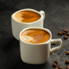 coffee freshly brewed in a white cup serving of beverage (coffee grain). food. top.copy save