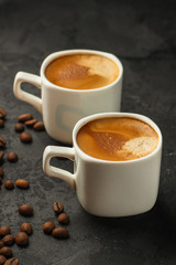 coffee freshly brewed in a white cup serving of beverage (coffee grain). food. top.copy save