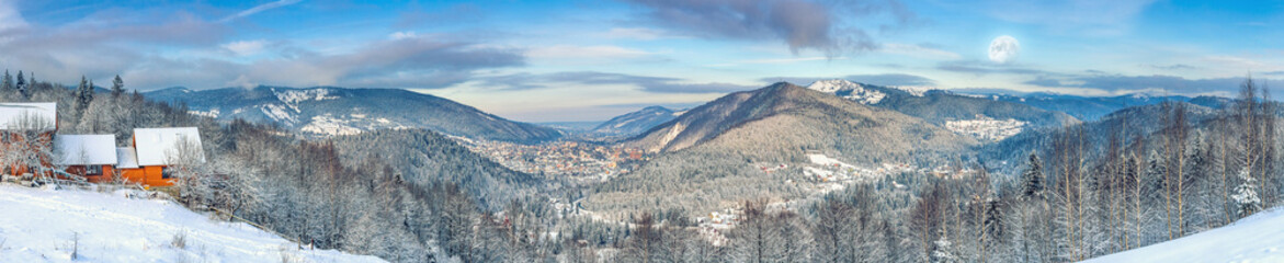 Winter landscape, panorama, banner - top view of the snowy mountain valley in the Carpathians, in Ukraine