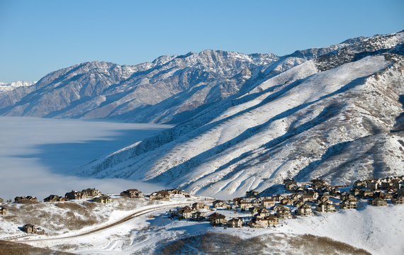 Mountain Homes with Smog in the Valley Below