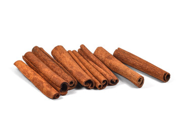 Spice. Cinnamon sticks on white background. Isolated, closeup.