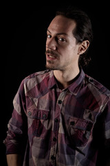 Obraz premium closeup portrait of a young man with back background and copy space