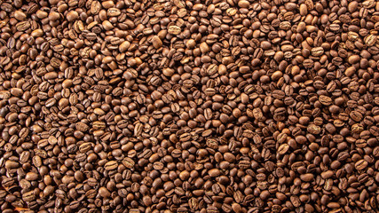 Coffee beans on the table background blurred abstract blurred
