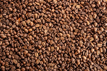 Coffee beans on the table background blurred abstract blurred