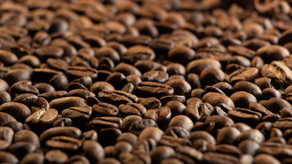 Coffee beans on the table background blurred abstract blurred