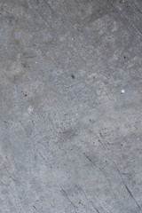 Grunge concrete wall with crack and stains in industrial building. Cement texture for design and background.