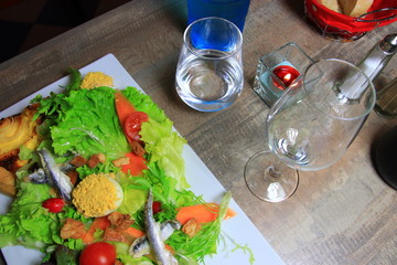 table of a French restaurant with glasses and flatware