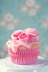 Cupcake with pink flowers