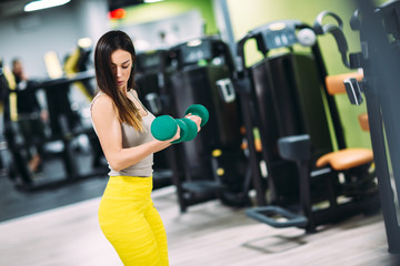 Beautiful fit woman at gym