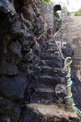 Secret steps made out of rock. In Tenby, Wales.