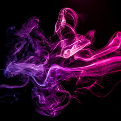 Colored smoke on black background